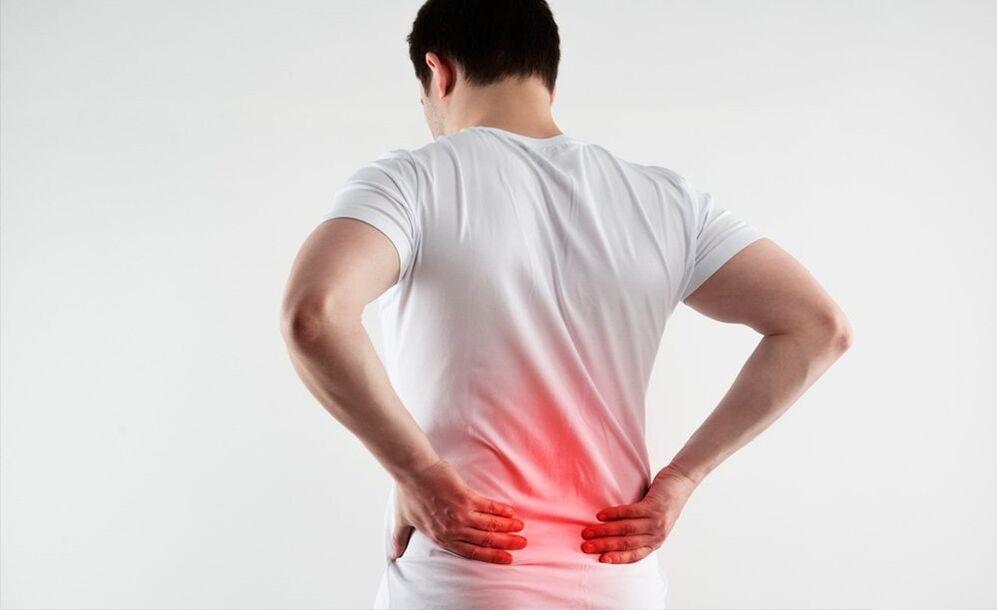 Schmerz am ënneschte Réck wéinst Osteochondrose